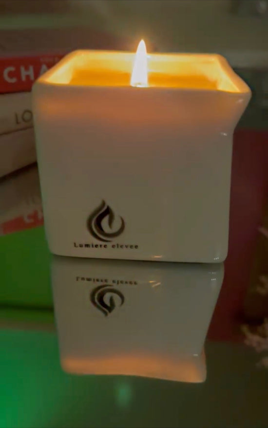 Relax, unwind and be touched gently. Unlock the true essence of relaxation with our warm vanilla scented message oil candle. This candle is handmade with all natural ingredients (Shea butter, Cocoa butter, Cocoa Creme Bees Wax, Vitamin E oil & Jojoba oil.